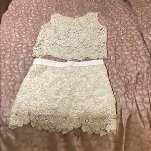 White and gold skirt and top with white leather